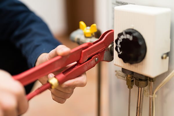 water heater with pliers